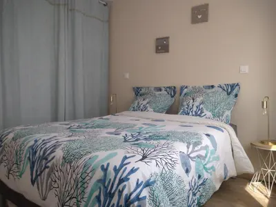 Un ou plusieurs lits dans un hébergement de l'établissement T2 charmant bord de mer Pornichet avec terrasse