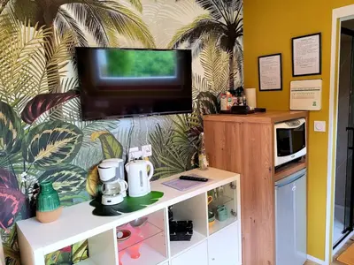 Cuisine ou kitchenette dans l'établissement Copacabana TINY HOUSE studio terrasse jardin