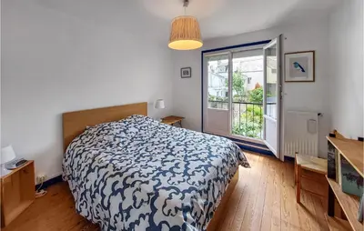 Un ou plusieurs lits dans un hébergement de l'établissement 2 Bedroom Awesome Home In Saint-Nazaire