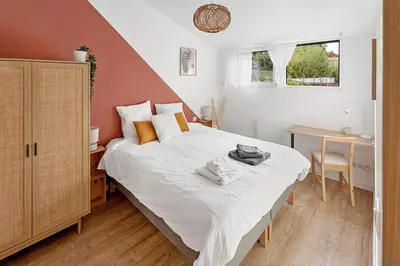 Un ou plusieurs lits dans un hébergement de l'établissement L'Annexe - Maison cosy au calme avec jardin