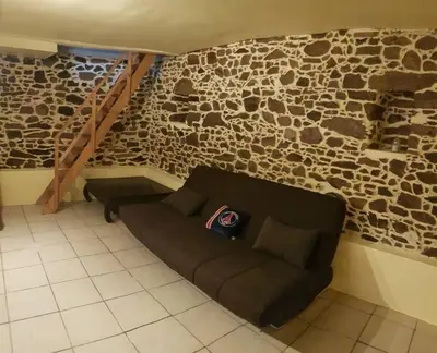 Coin salon dans l'établissement Maison charmante avec jardin centre-ville proche puy du fouu Arrivée autonome