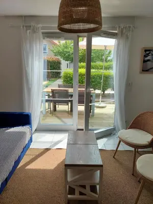 Coin salon dans l'établissement Maison 3 piscines - Résidence 3 étoiles