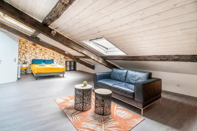 Coin salon dans l'établissement T3 Duplex de charme au cœur du quartier historique