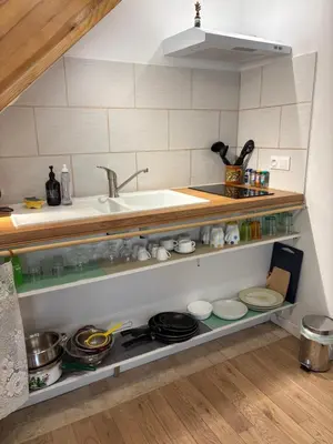 Cuisine ou kitchenette dans l'établissement Magnifique logement avec sauna infra rouge