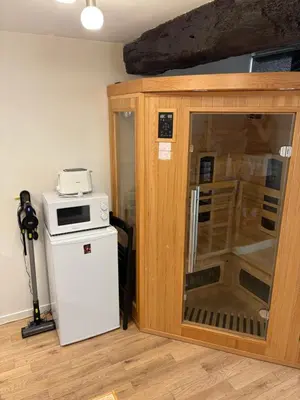 Cuisine ou kitchenette dans l'établissement Magnifique logement avec sauna infra rouge