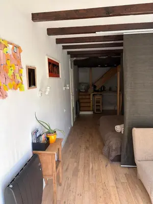Coin salon dans l'établissement Magnifique logement avec sauna infra rouge