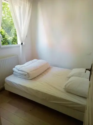 Un ou plusieurs lits dans un hébergement de l'établissement Maison à 300 m de la plage!