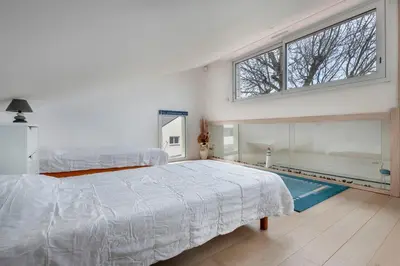 Un ou plusieurs lits dans un hébergement de l'établissement Maison à 300 m de la plage!