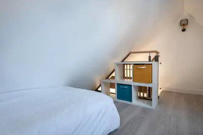 Un ou plusieurs lits dans un hébergement de l'établissement Appartement vue mer et les pieds dans l'eau!