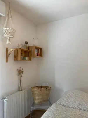 Un ou plusieurs lits dans un hébergement de l'établissement Cosy Room