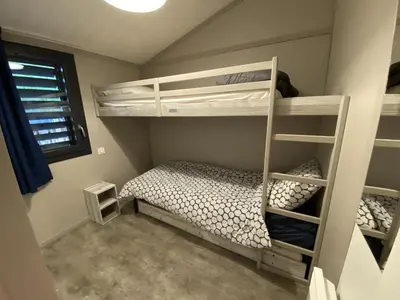 Un ou plusieurs lits dans un hébergement de l'établissement Chalet pour 5 - Piscine couverte - St Hilaire