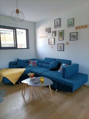 Coin salon dans l'établissement Charmante Maison 