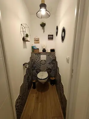 Coin salon dans l'établissement Charmante Maison 