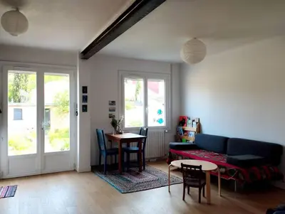 Coin salon dans l'établissement Maison avec jardin au calme