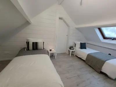 Un ou plusieurs lits dans un hébergement de l'établissement Maison rénovée 4 ch. avec jardin, à 700m de la plage et proches commerces - St Brevin Les Pins - FR-1-364-152