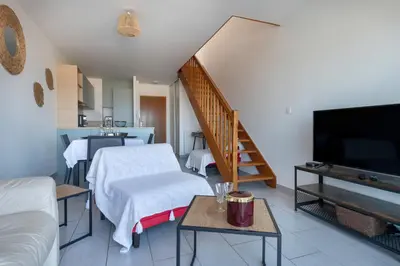 Télévision ou salle de divertissement dans l'établissement Face Mer - Bel appartement pour 4