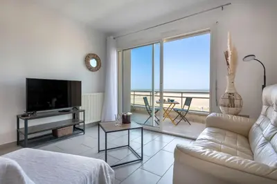 Télévision ou salle de divertissement dans l'établissement Face Mer - Bel appartement pour 4