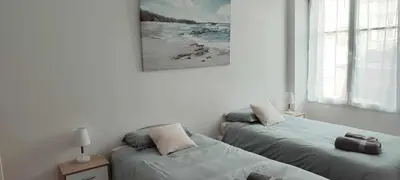 Un ou plusieurs lits dans un hébergement de l'établissement Logement récent 3 chambres à 200m mer et commerces