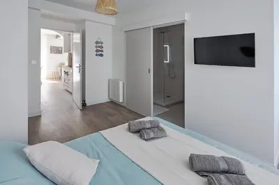 Un ou plusieurs lits dans un hébergement de l'établissement Logement récent 3 chambres à 200m mer et commerces