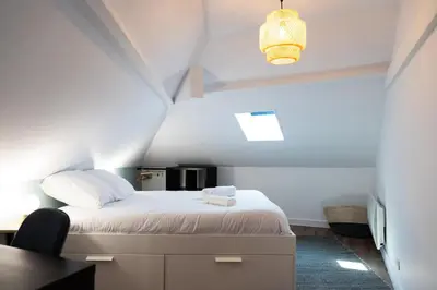 Un ou plusieurs lits dans un hébergement de l'établissement Duplex T3 moderne et lumineux Angers