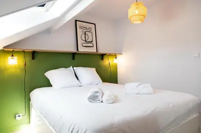 Un ou plusieurs lits dans un hébergement de l'établissement Duplex T3 moderne et lumineux Angers