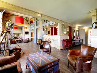 Coin salon dans l'établissement Brit Hotel Essentiel Cholet