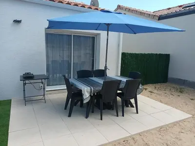 Terrasse ou espace extérieur de l'établissement Maison récente Océadune avec piscine hors-sol l'été