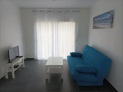 Télévision ou salle de divertissement dans l'établissement Maison récente Océadune avec piscine hors-sol l'été