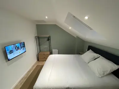 Un ou plusieurs lits dans un hébergement de l'établissement Myaka©Appartement Boho