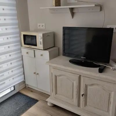 Cuisine ou kitchenette dans l'établissement Studio attenant a la maison principale