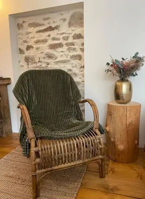 Coin salon dans l'établissement La Petite Grange - Spa Balnéo