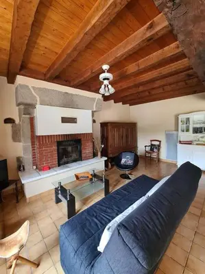 Coin salon dans l'établissement Chez Lili Maison de campagne gîte familial