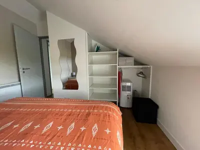 Un ou plusieurs lits dans un hébergement de l'établissement Maison de 2 chambres proche A11 Ancenis, Logis du Château Rouge