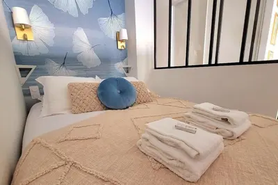Un ou plusieurs lits dans un hébergement de l'établissement Magnifique Studio 2 personnes - VUE MER 