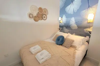 Un ou plusieurs lits dans un hébergement de l'établissement Magnifique Studio 2 personnes - VUE MER 