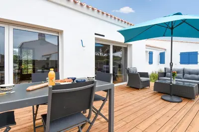 Coin salon dans l'établissement Maison pour 7 - 400 m de la plage de la Clère