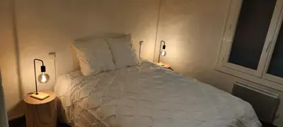 Un ou plusieurs lits dans un hébergement de l'établissement Maison 3 chambres avec Jacuzzi à 400m des plages