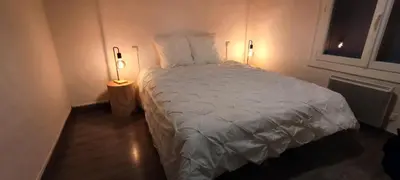 Un ou plusieurs lits dans un hébergement de l'établissement Maison 3 chambres avec Jacuzzi à 400m des plages