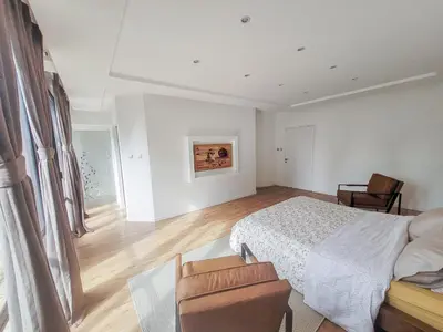 Un ou plusieurs lits dans un hébergement de l'établissement Maison 12 personnes, Vendée et puy du fou
