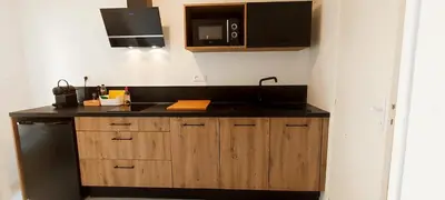 Cuisine ou kitchenette dans l'établissement La Douce Angevine - La Perruche - Proche centre