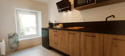 Cuisine ou kitchenette dans l'établissement La Douce Angevine - La Perruche - Proche centre