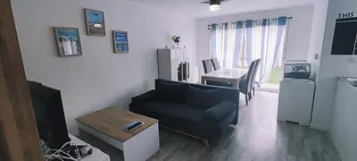 Télévision ou salle de divertissement dans l'établissement Maison familiale proche plage et commerces