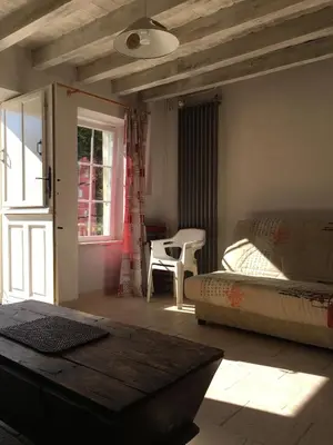 Coin salon dans l'établissement Gite Le Puy Rabasteau