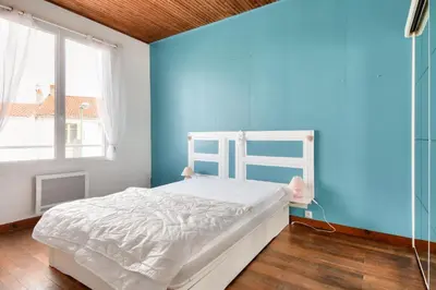 Un ou plusieurs lits dans un hébergement de l'établissement Maison pour 7 à 100m de la plage - Jardin