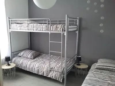 Un ou plusieurs lits dans un hébergement de l'établissement Maison avec jardin- Cholet - 20 mn du puy du fou