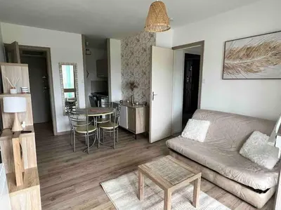 Coin salon dans l'établissement Appartement à 100 m de la plage avec parking