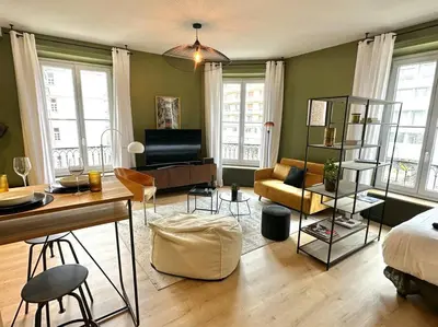 Coin salon dans l'établissement Bel appart Bd Foch