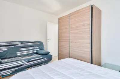 Un ou plusieurs lits dans un hébergement de l'établissement Appartement pour 4- Balcon- Plage des Becs