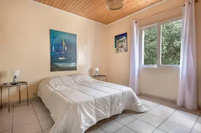 Un ou plusieurs lits dans un hébergement de l'établissement Maison Dune et Forêt à 100m de la mer