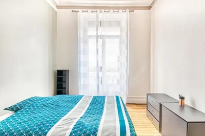 Un ou plusieurs lits dans un hébergement de l'établissement Hyper centre, Premium, spacieux appartement haussmannien